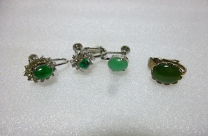 Jade green stone earrings together
