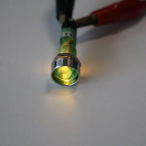 Lamp AC6V green, round metal + plastic bracket