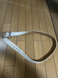 Buy at a thrift store! Thick genuine leather (cowhide) embossed design white color belt