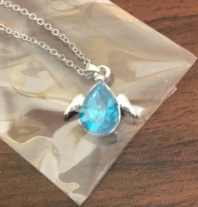 Necklace with a tier drop pendant (Blue Purse) imagined by the tears of an angel