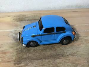 Volkswagen Beatle tin tinching minicar at that time! Blue color